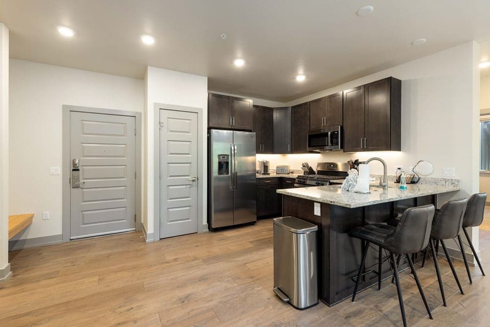 Breakfast bar with seating for three.