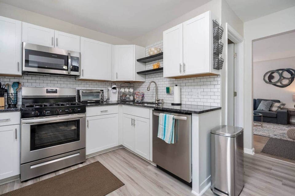 Kitchen with granite counter tops, stainless steel appliances including dishwasher.  Keurig coffee pot, everything you need to make stay at home meals.  