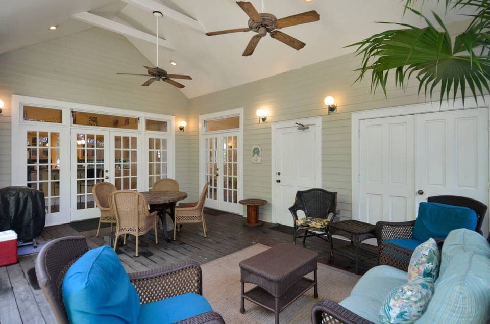 Spacious outdoor deck with plenty of seating areas.