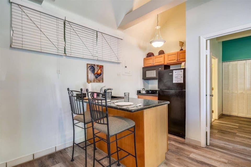 Kitchen features countertop seating.