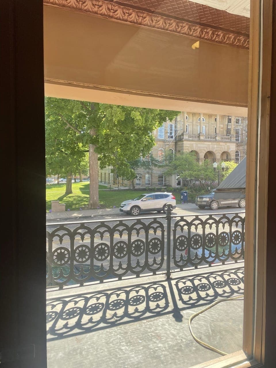 Balcony looking out at courthouse.