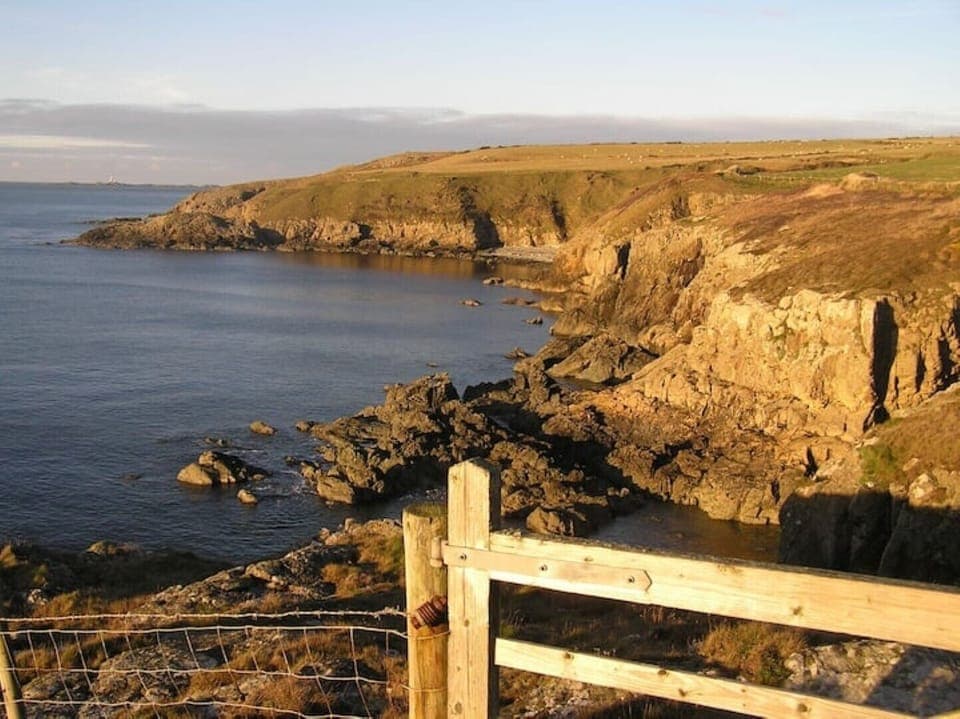 along the Anglesey coastal footpath, a short distance away