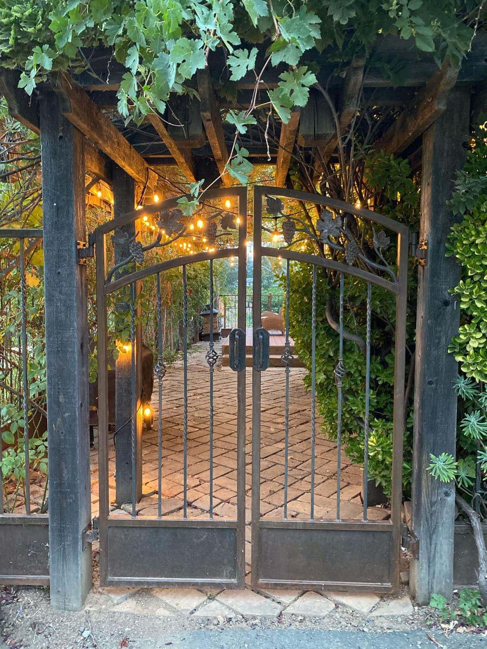 Wrought iron gate entrance to Lake Cottage.