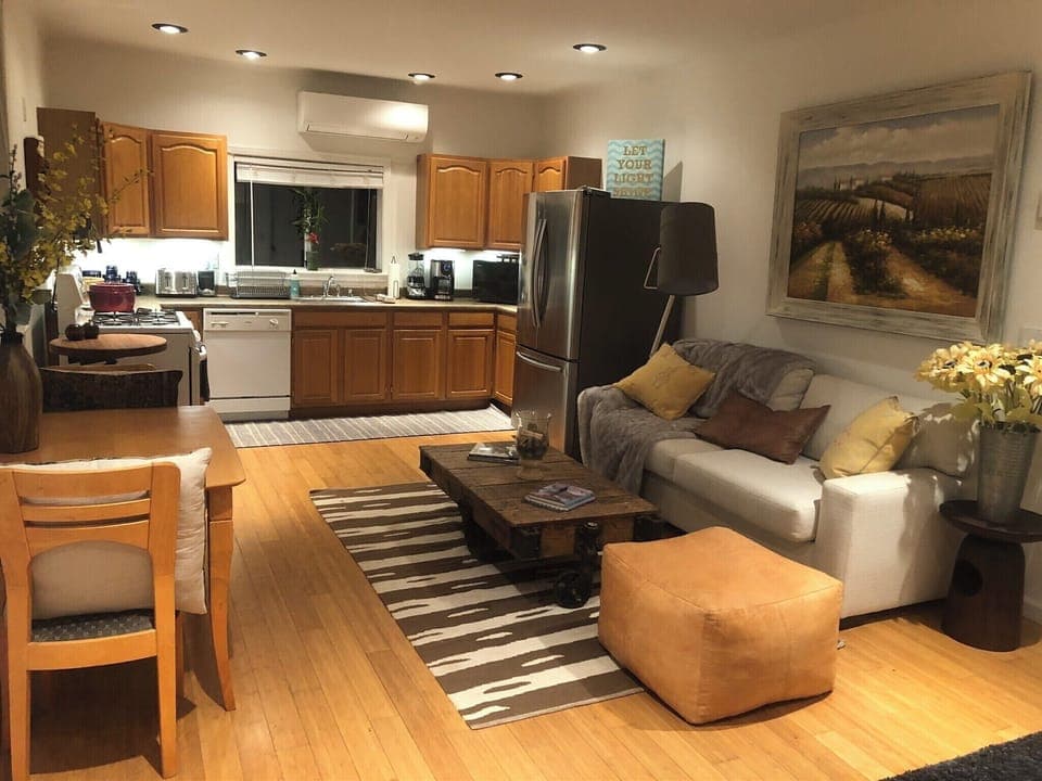 Full Kitchen with indoor dining table & hide-a-bed couch has a comfy mattress. 