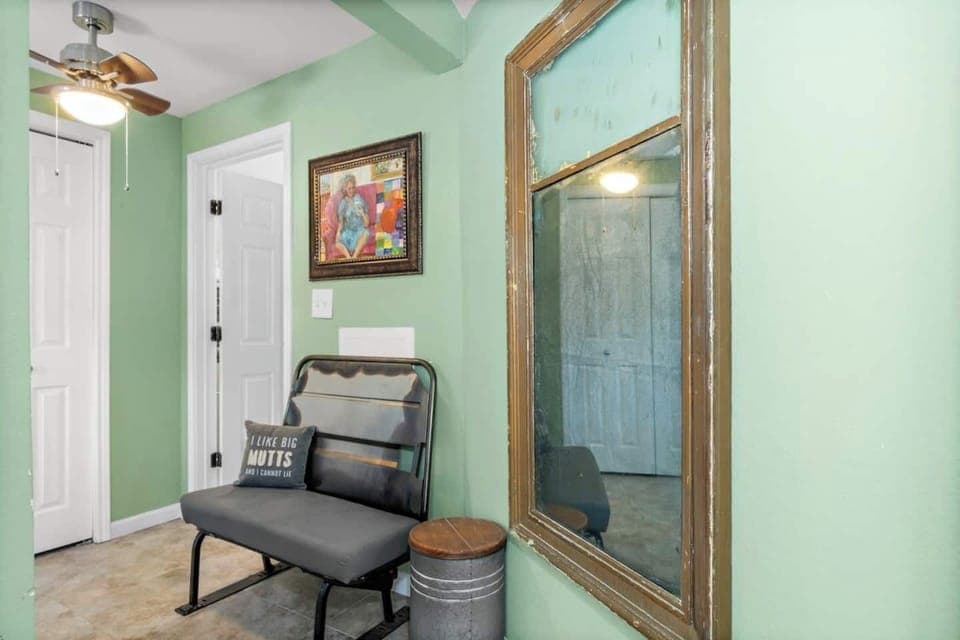 Nook area outside the Master Bedroom/Bath with a door that takes you into the fenced area into the sunny courtyard.