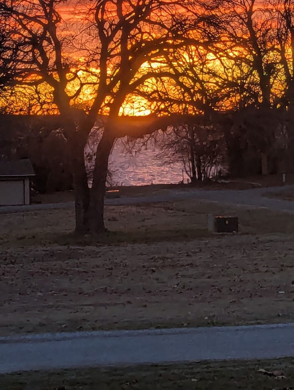 Winter sunset view of the lake from our front porch
