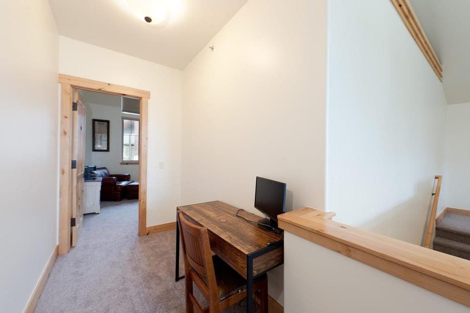 Desk with monitor outside Master Bedroom
