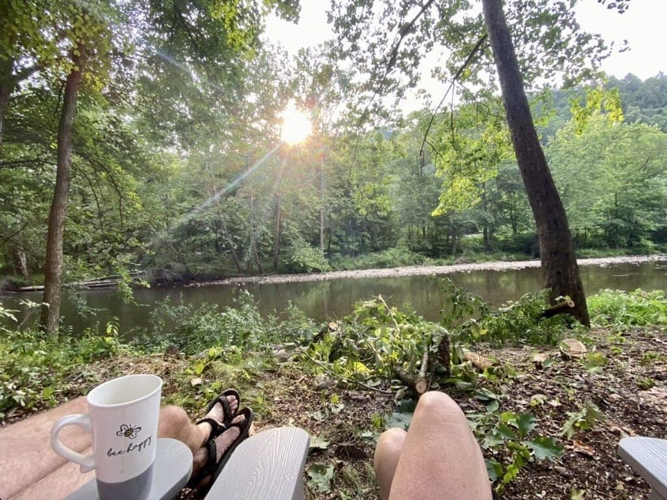 Adirondack chairs creekside, in winter folding chairs located in deck box 