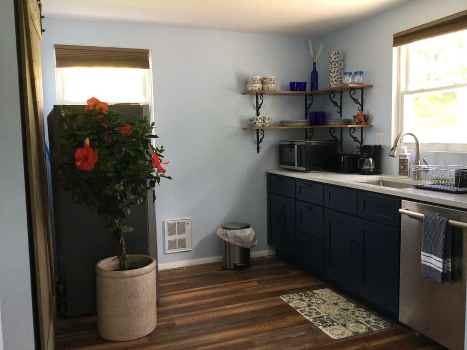 Full kitchen with dishwasher.