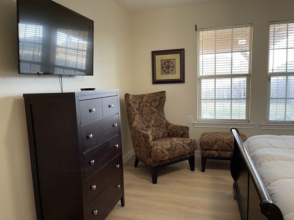 Master bedroom with TV & sitting area