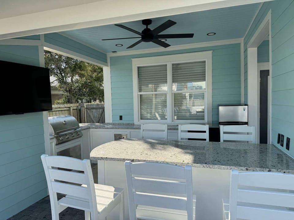 Brand New Summer Kitchen & Bar! Complete with Icemaker, 4 barstools, and a fridge! It's the Tiki Bar for Maximum Fun.