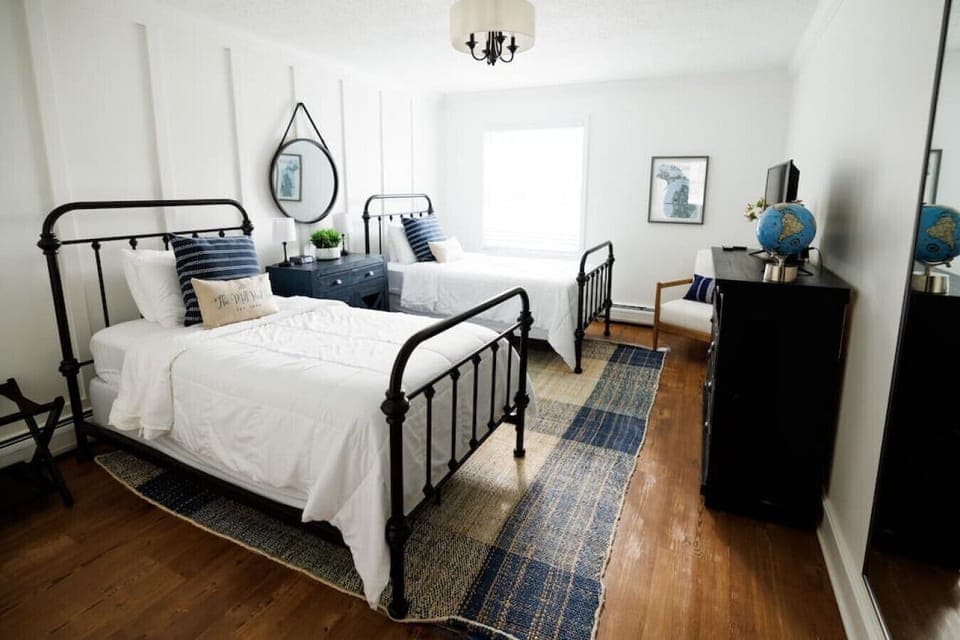 The second bedroom contains two twin beds, a reading chair and storage dressers. You will find extra towels and bathroom necessities in the dresser.
