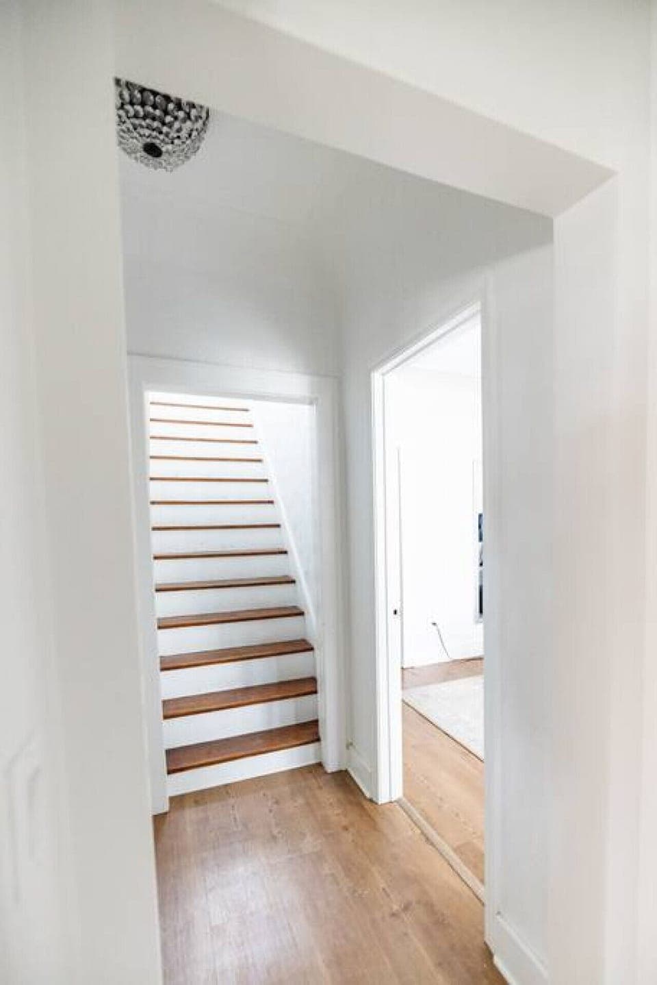 Your private entrance leads you into the foyer. To the left you will find the stairs to the second floor. To the right you will find the main floor bedroom and attached bathroom.