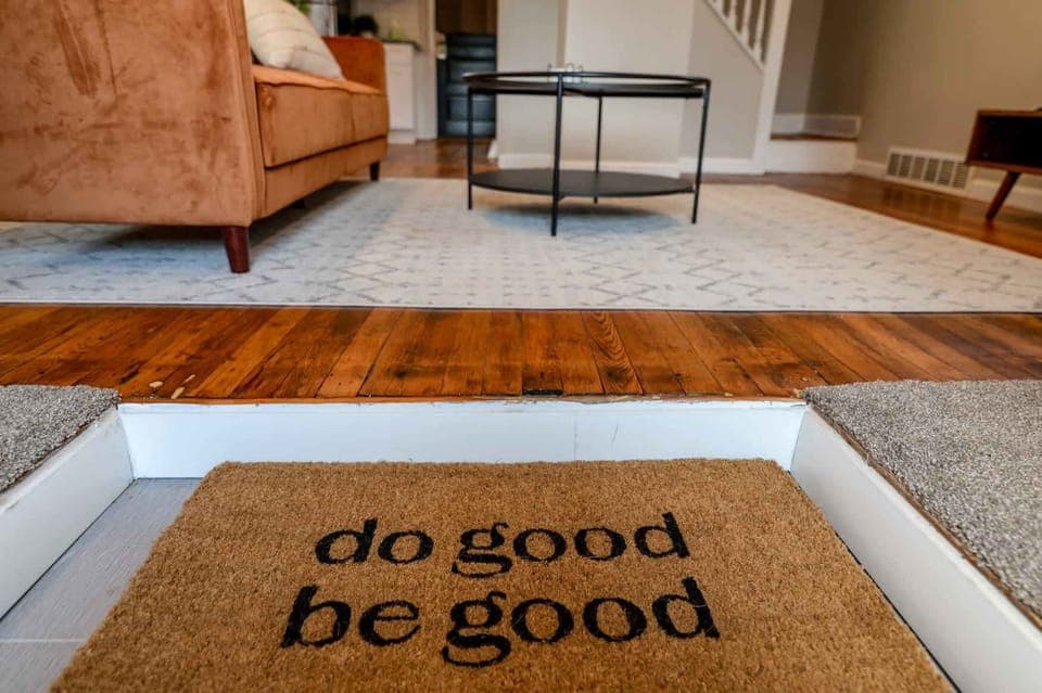 Start your stay with positive vibes—our welcome mat reminds you to 'Do good, be good' every time you step in