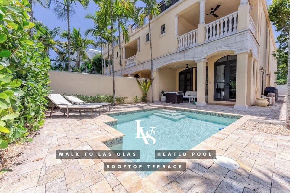 Las Olas Townhouse (3 Levels with Elevator & Stairs)
5 Minute Walk to Las Olas Blvd. 
4 Bedroom & 3 1/2 Bathrooms)
Heated Dipping Pool/BBQ/A lot of outdoor Space
Rooftop Terrace 
Balconies off Primary & Secondary Bedrooms 
Gated Private Patio on grou