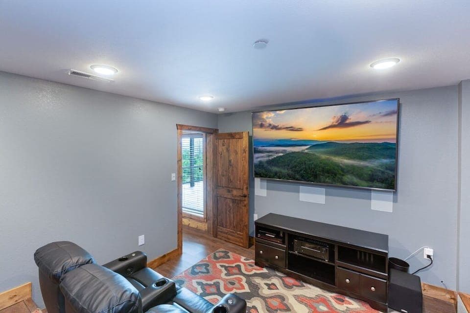 Comfy theater chairs in movie room!  Enjoy movie nights with the 85" SmartTV!