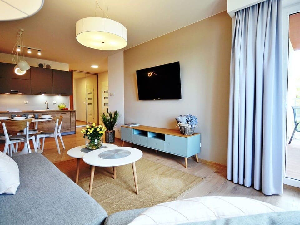 Furniture, Property, Couch, Building, Table, Comfort, Television, Decoration, Plant, Azure