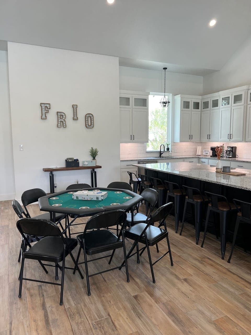 Poker table complete with cards and chips for a late night game.