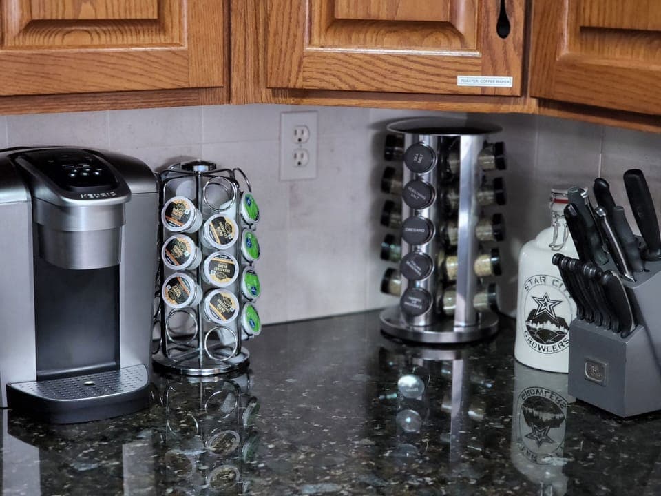 Keurig and spice rack, full kitchen with all cooking needs provided. 