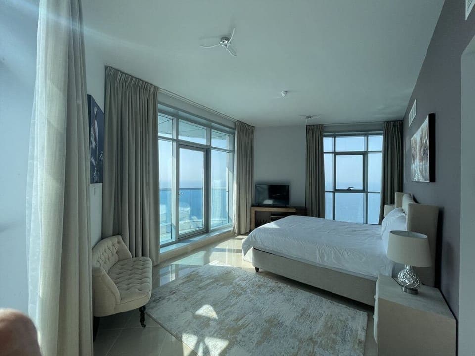 Master bedroom with full sea view from all windows and full blackout curtains.