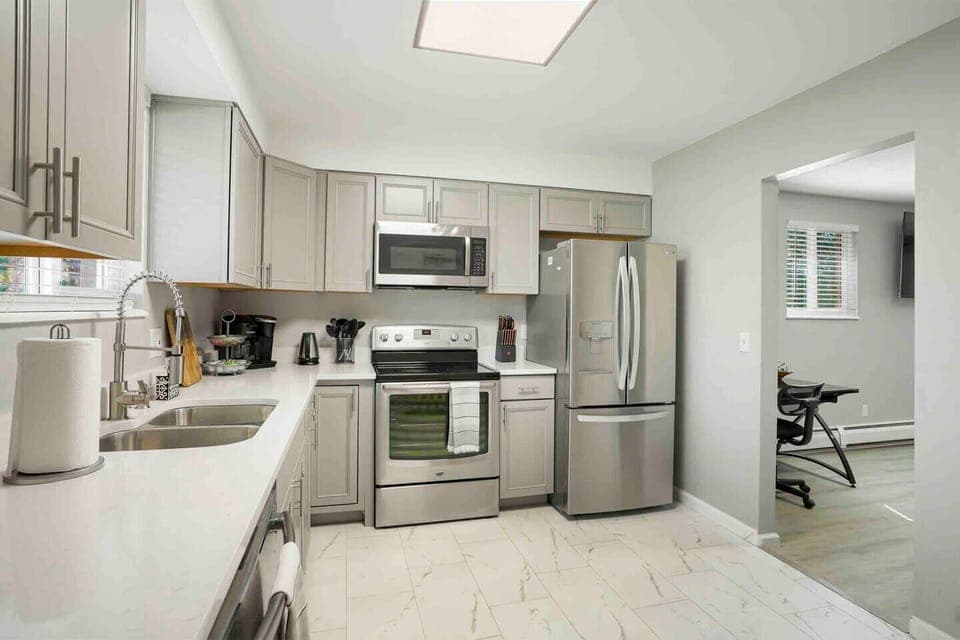 Kitchen is brand new and has quartz countertops, and plenty of cooking space. Coffee station is fully stocked and ready!