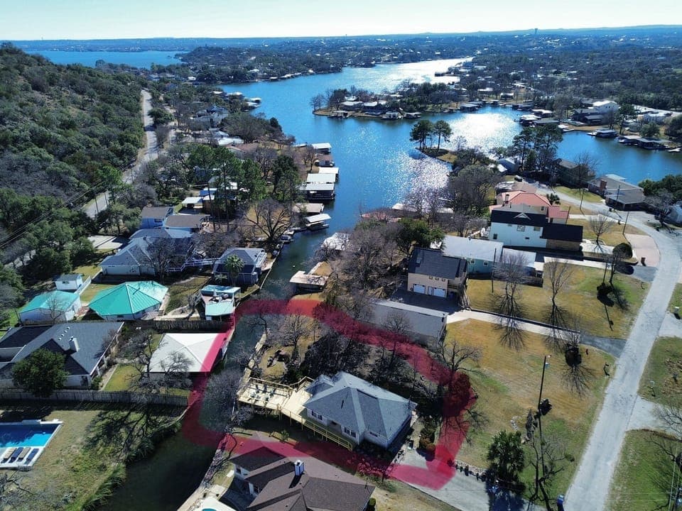 3 houses down in the canal to open waters