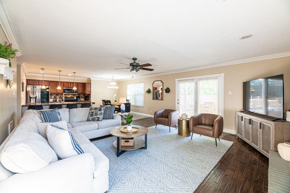 The open concept living space means, whether you're enjoying a meal or hanging out in the living room, you'll never miss a minute together.