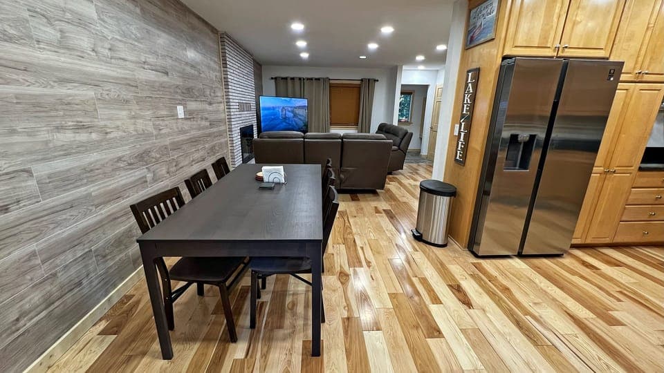 Dining area with table that seats 8 and can extend to accommodate up to 10. 