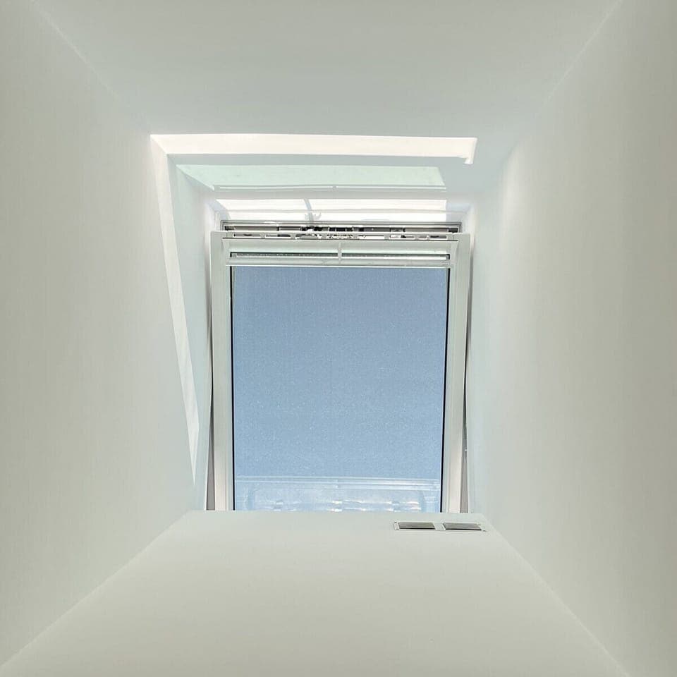 2 electronic skylight ceiling windows in kitchen + bedroom provide air + light.