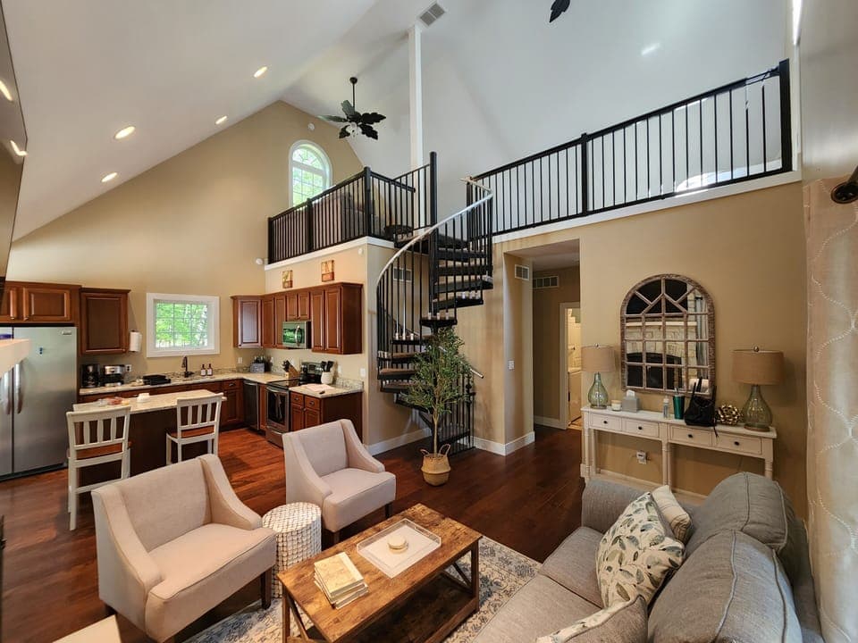 Vaulted ceilings, open floorplan, and loft with additional queen bed. 