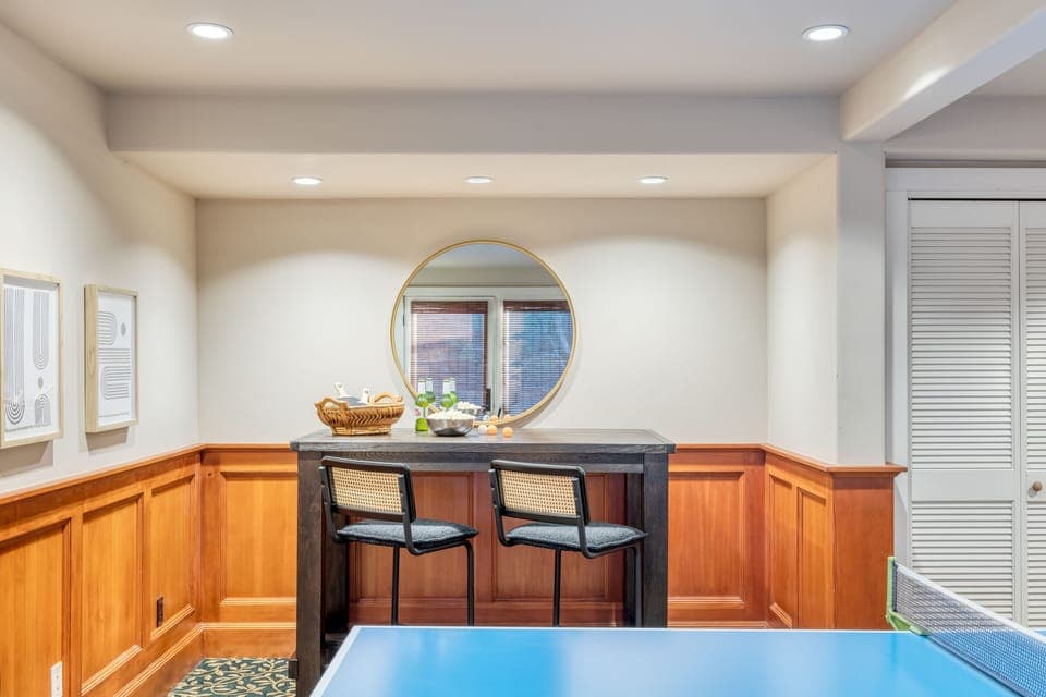 Small sitting area near the ping-pong table.