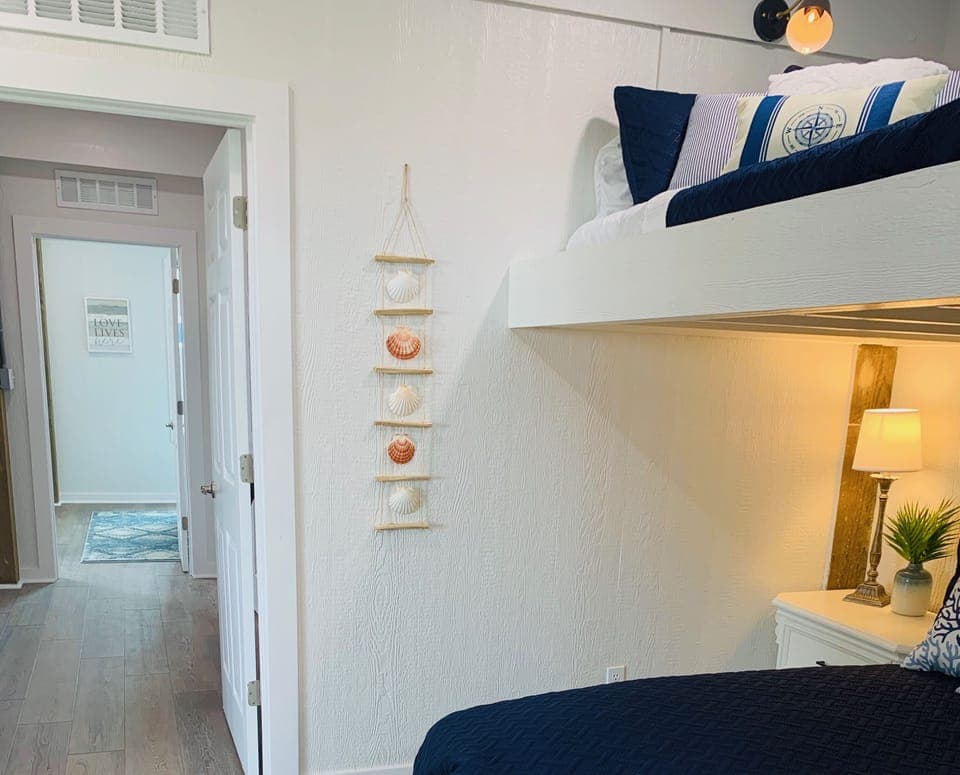 Hallway connecting bedroom #4 & #5. Full bathroom access for rooms in hall. 