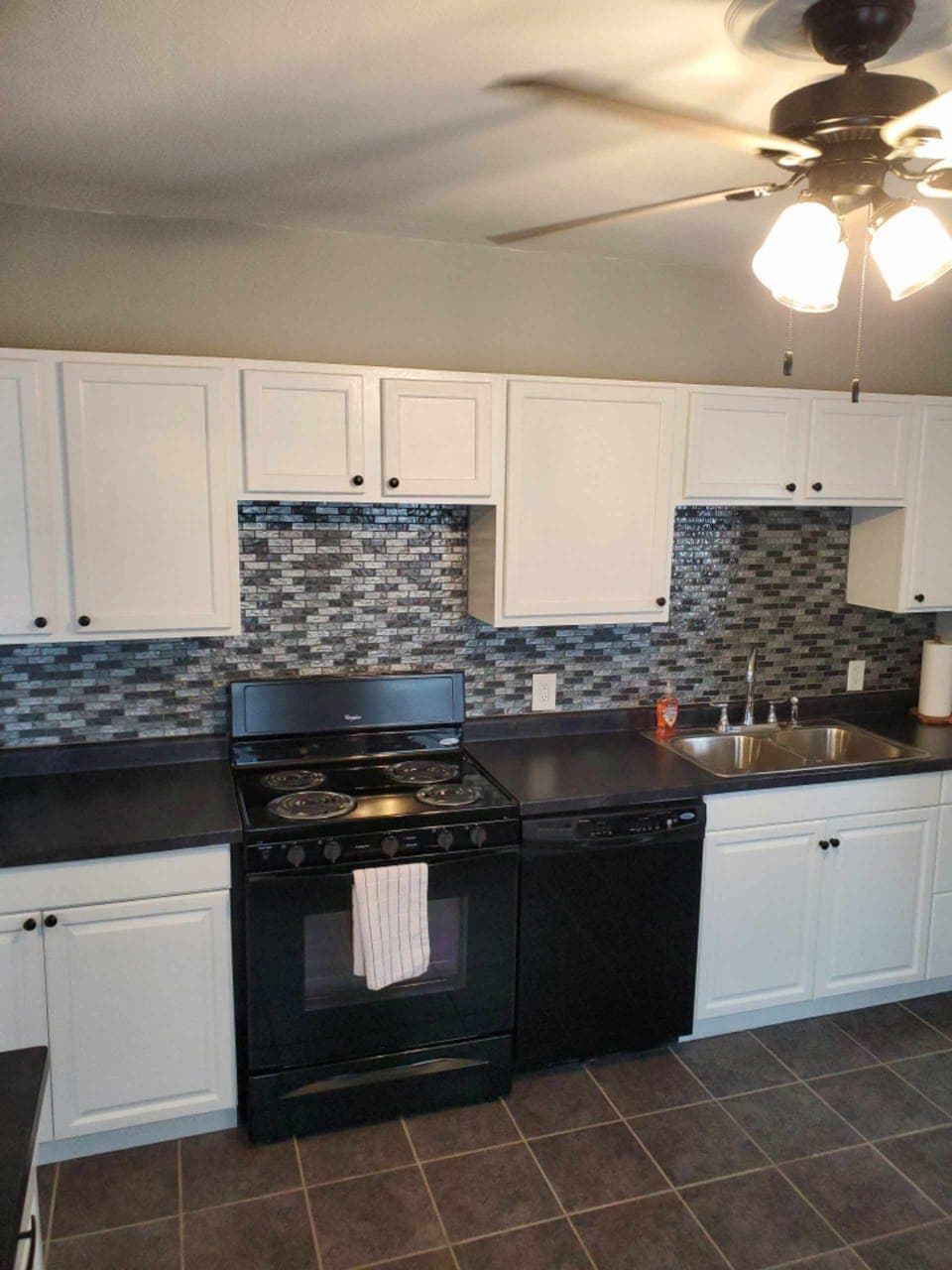 Large, fully stocked kitchen. 