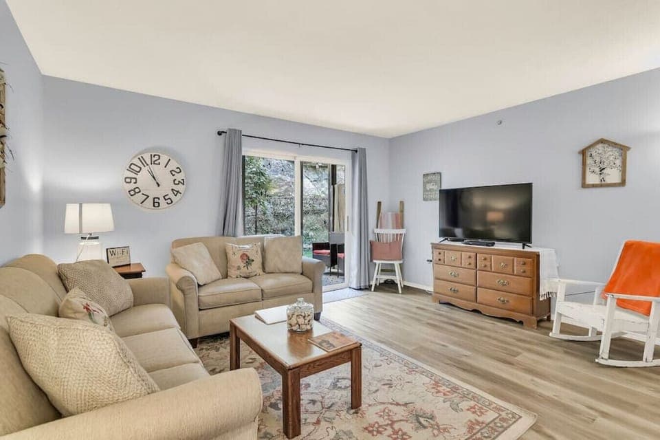 Living Room stocked with board games and movies.