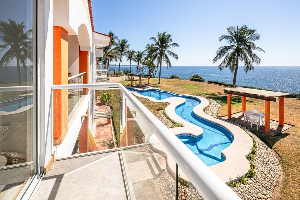 Private balcony overlooks shared back yard and pool. 6 units that share the pool