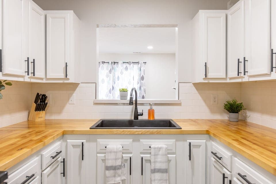 Fully stocked Kitchen with plenty of counter space.