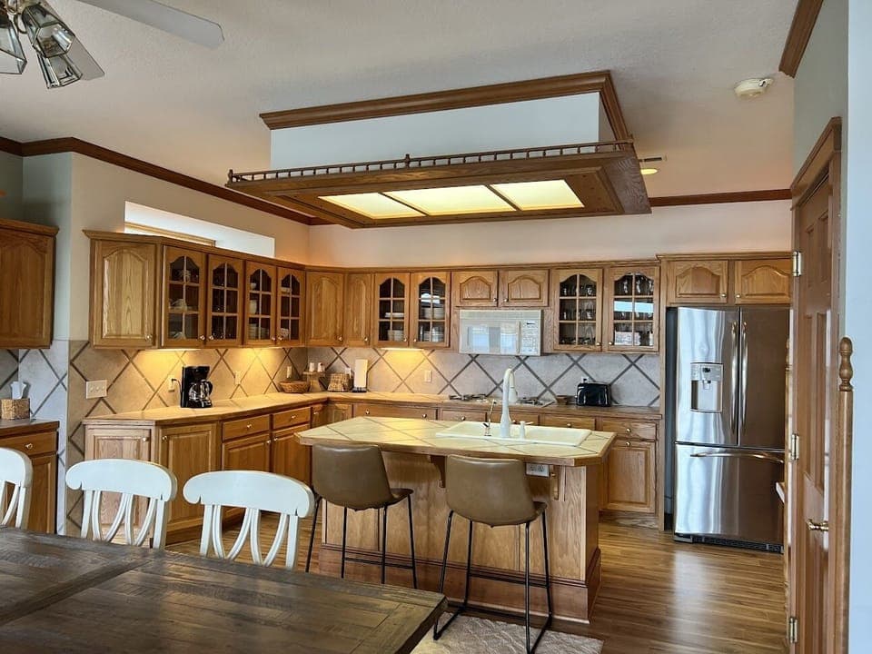 Enjoy meals at the counter seating 2 and the family sized table seating 10.