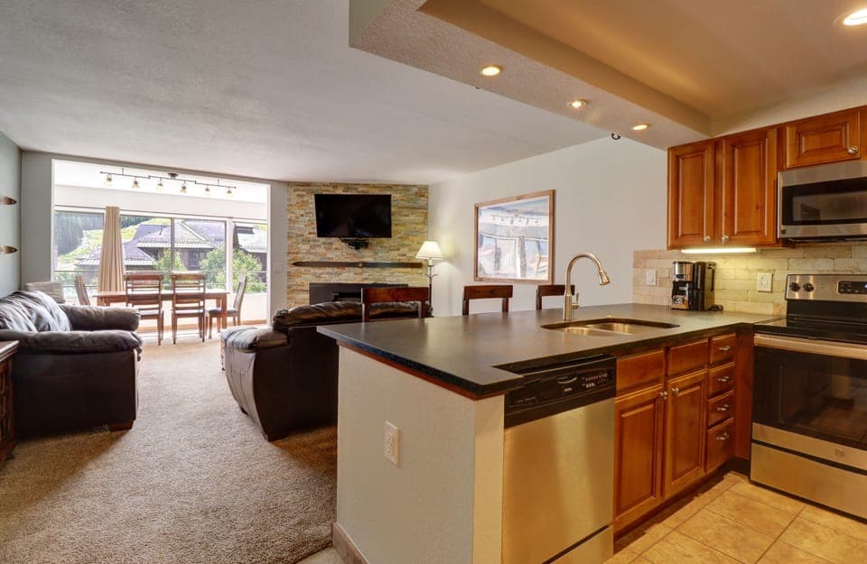 Open plan kitchen looking into the living room.