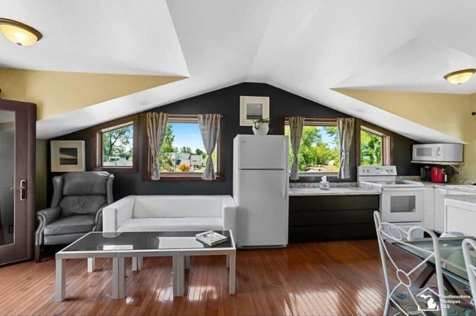 Living area with TV and kitchen