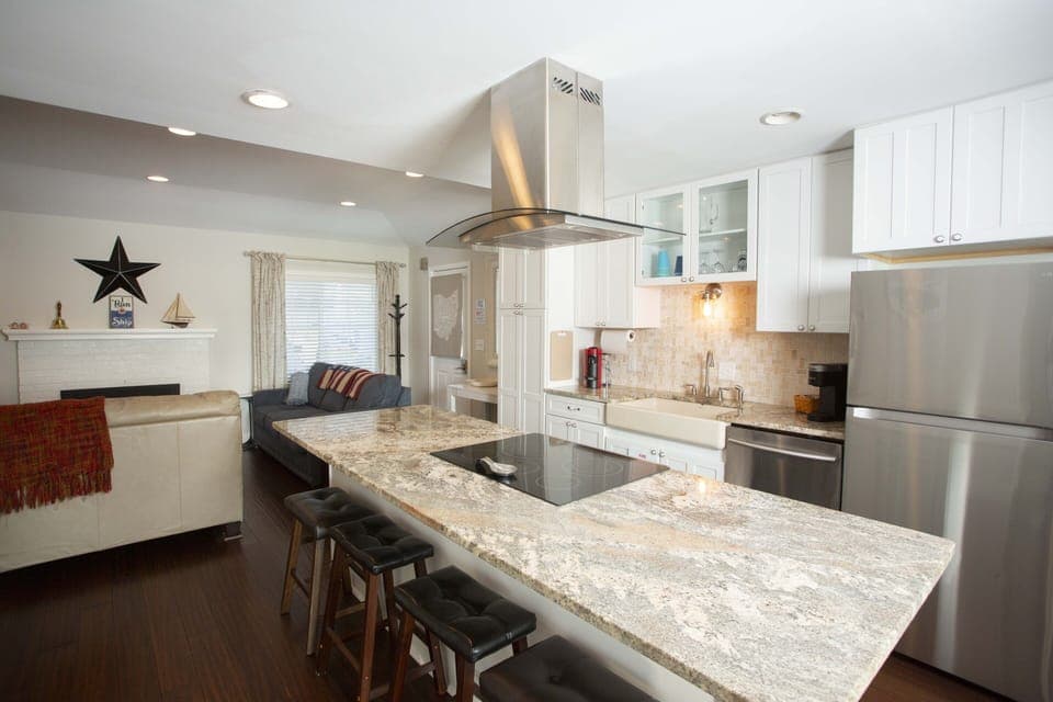 Large kitchen island with barstools.