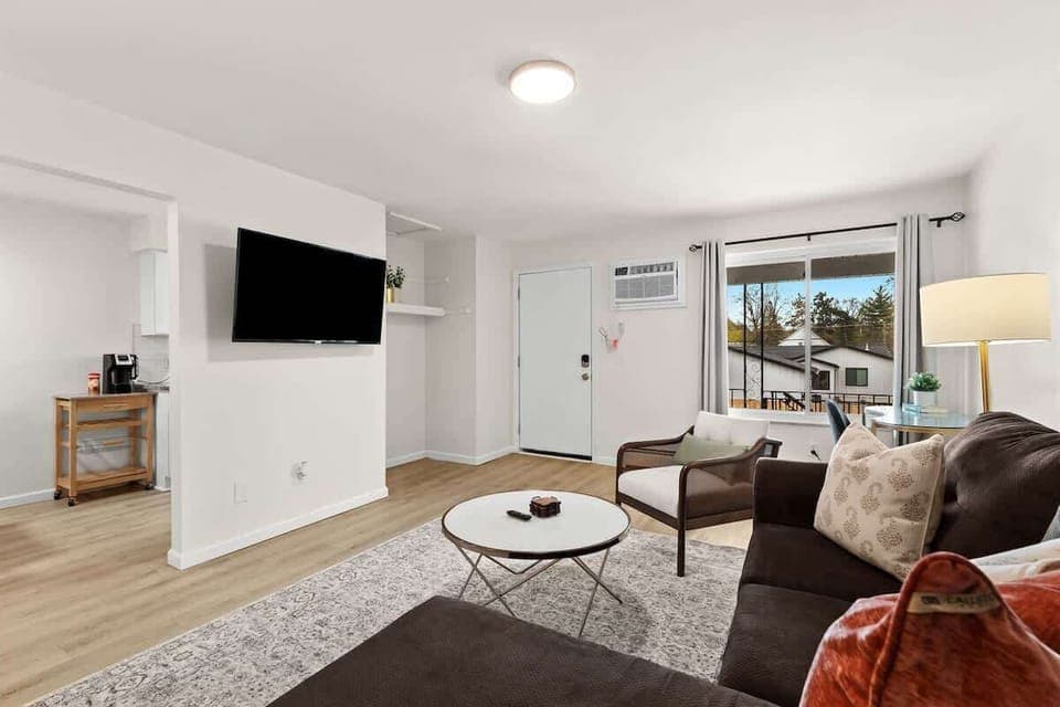 Beautifully Decorated Living Room with 55" Smart TV with Your Favorite Apps