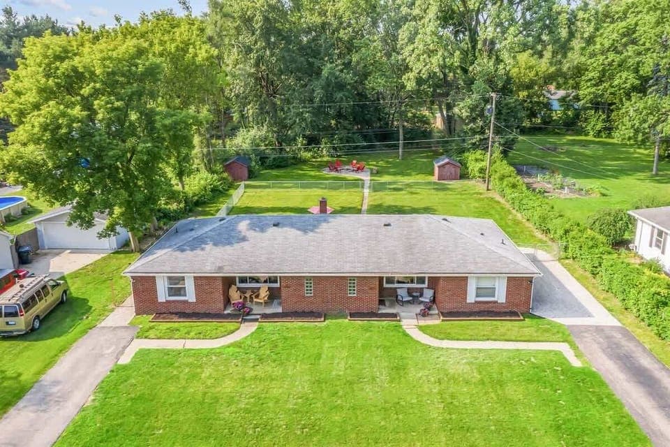 Unique Brick Duplex on 1 Acre lot in prime Shelby Township location
