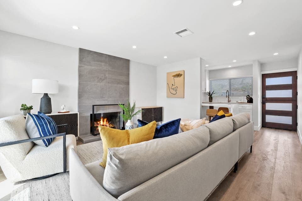 Living room with fireplace and flatscreen smart TV (not pictured)
