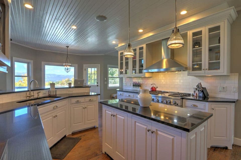 Spacious kitchen with top-of-the-line range and mountain views