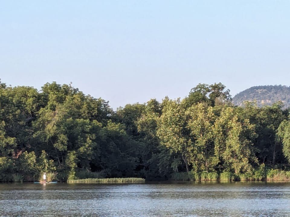 Creek inlet directly on opposite side of lake.