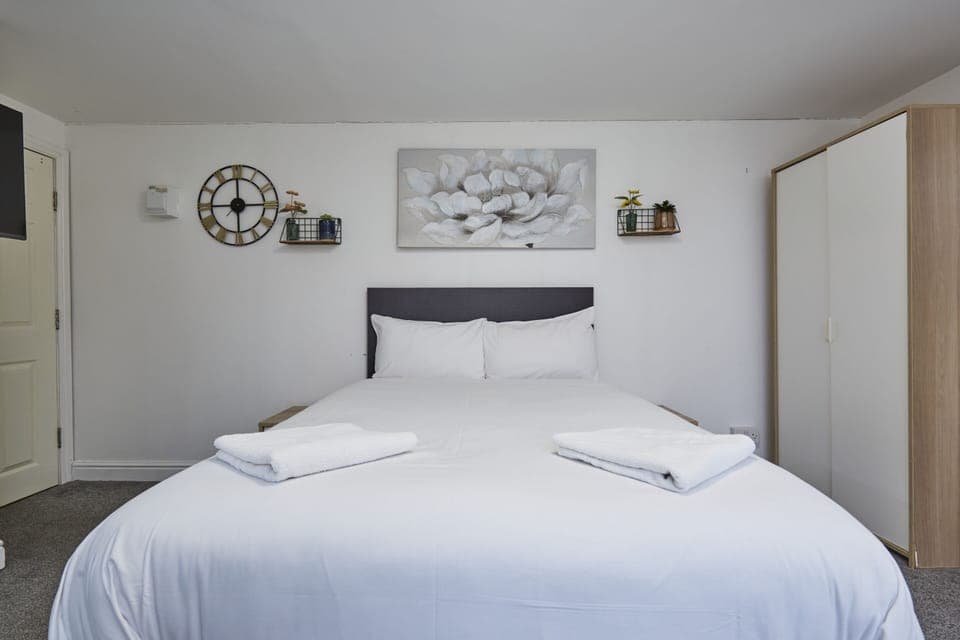 Spacious bedroom ideal for business travellers and families