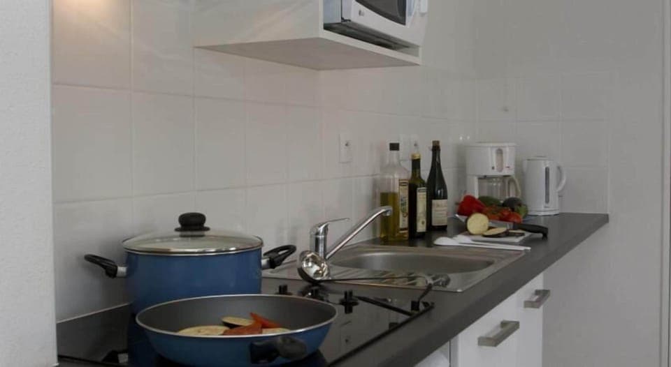 Whip up a quick bite to eat in the kitchen.