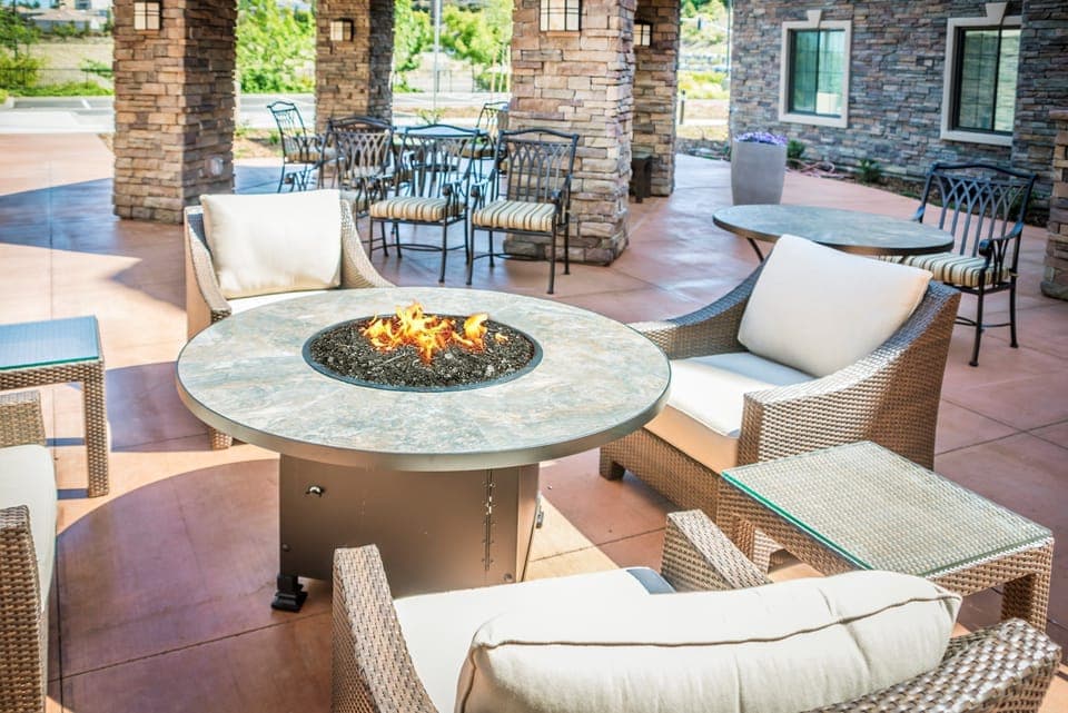 Share laughs around the outdoor fire pit with your group.