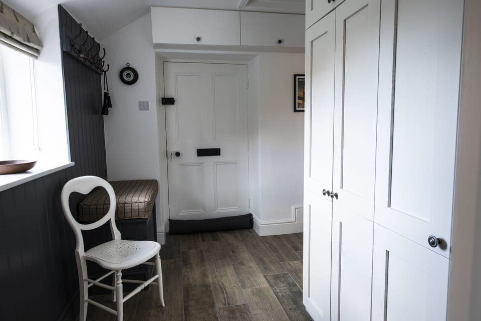 Ground floor: Boot room leading to the utility area