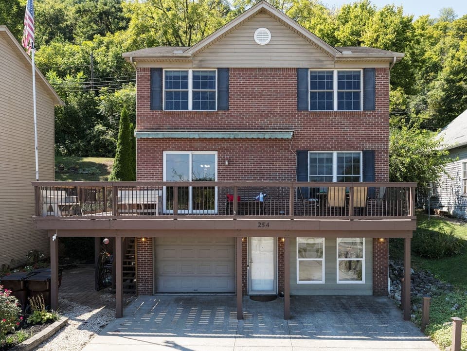 Enjoy a cup of coffee or meal on the front deck with river views